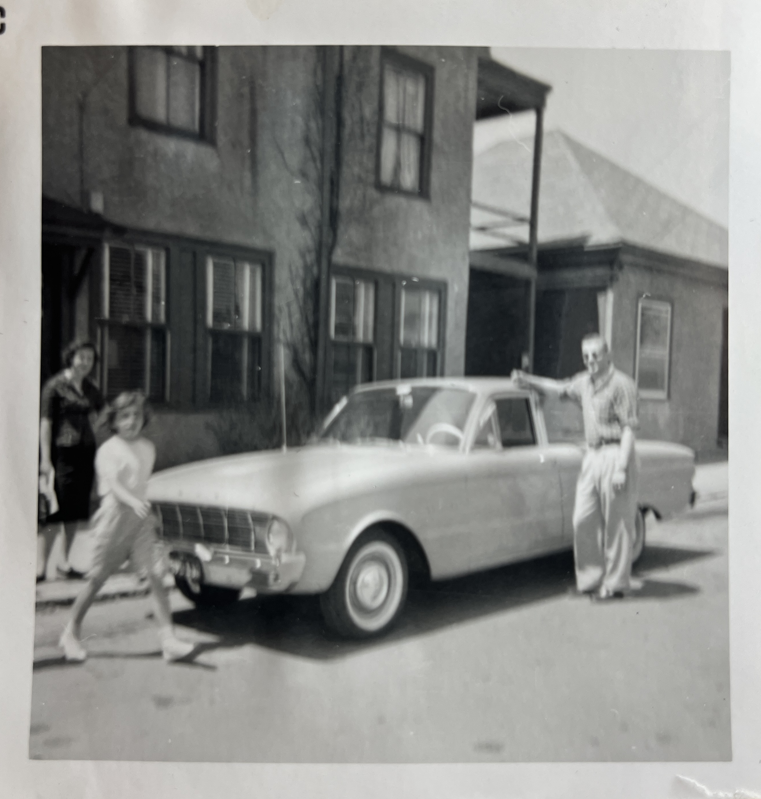 My grandfather with a sweet ride outside their house on Goat Hill