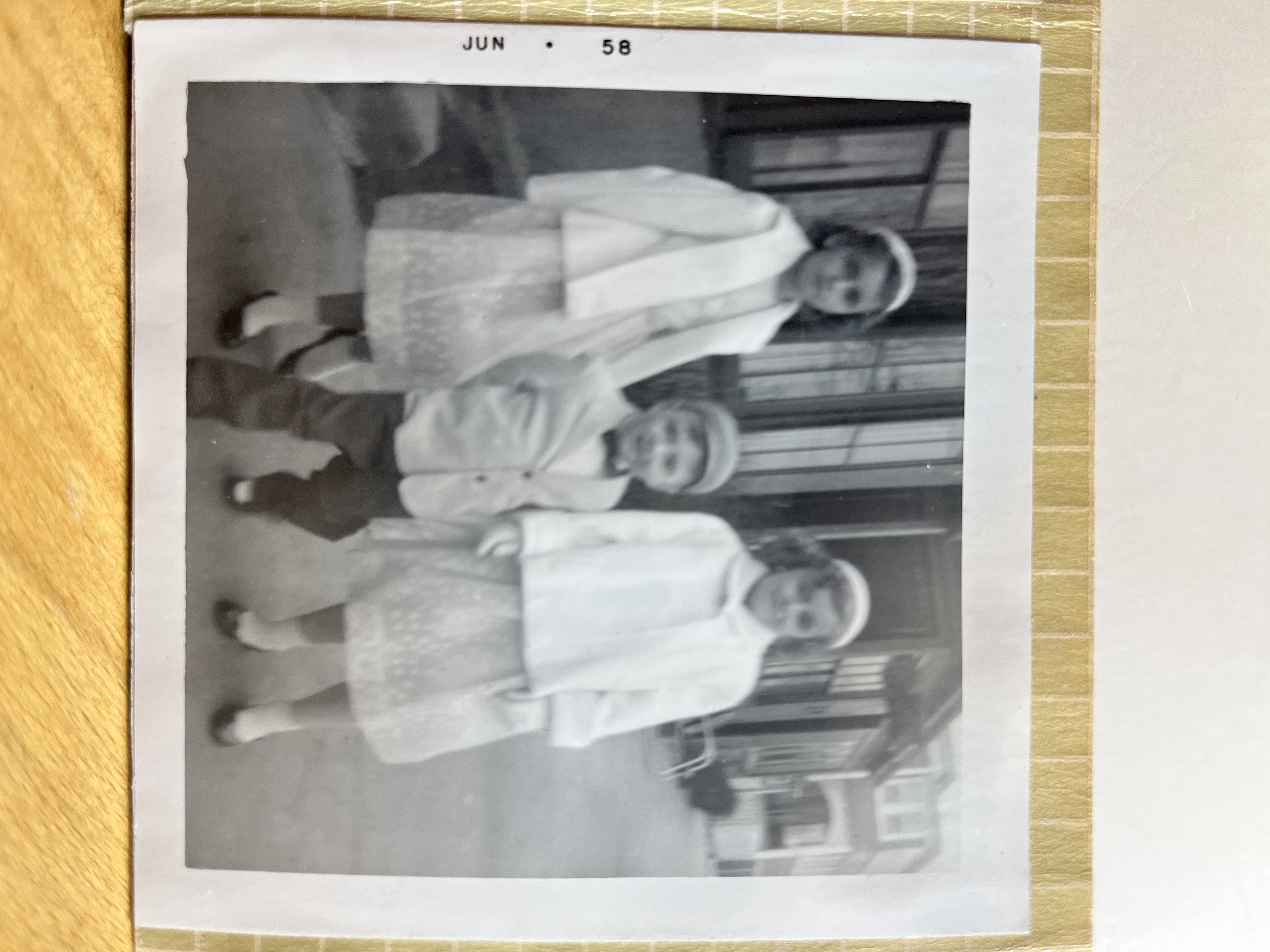 Aunts and uncle outside their house on Goat Hill