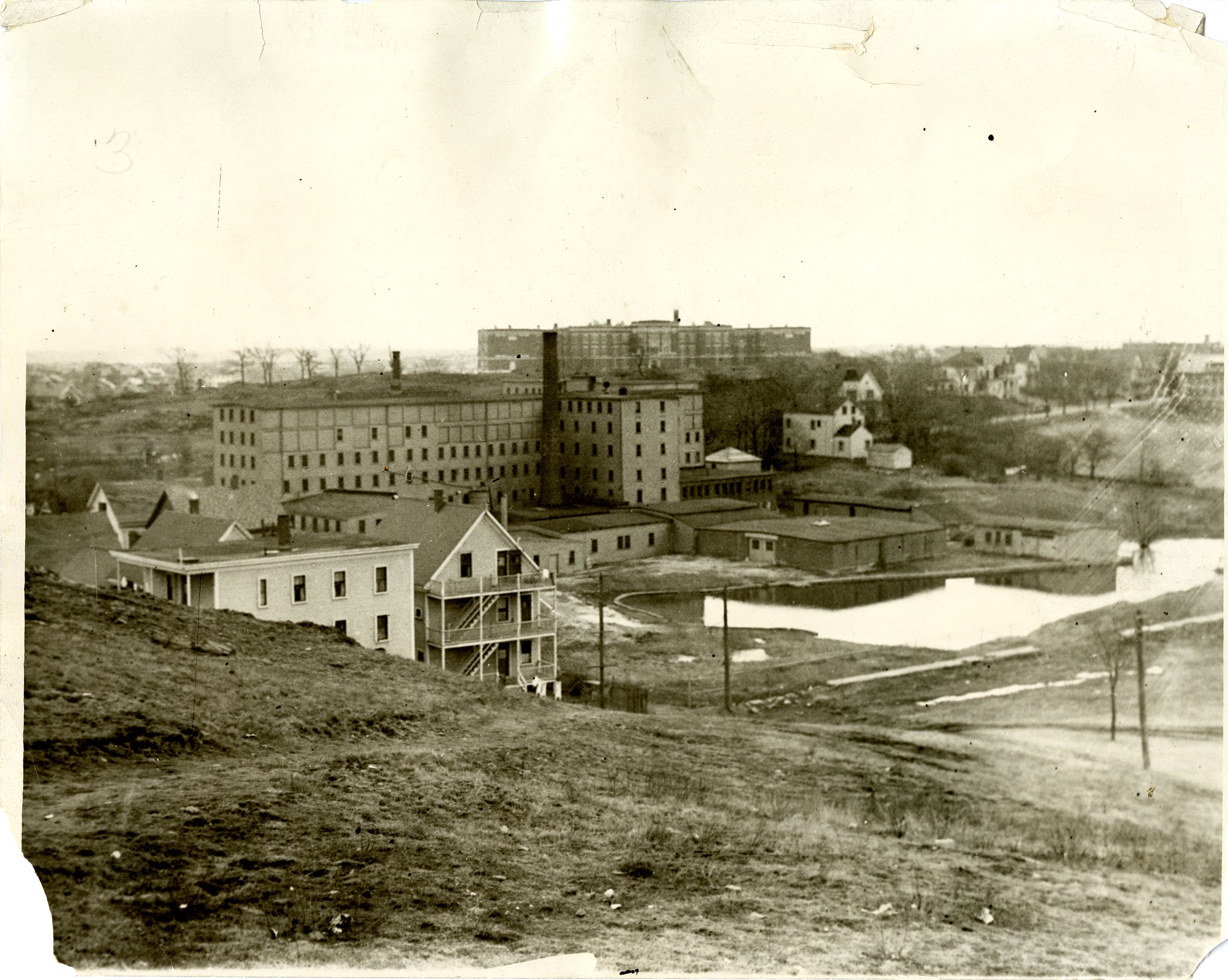 This is the photo that blew my mind! Seeing that huge factory in the park I grew up in totally shifted my understanding of the area. Langdon St is in the foreground, the old Salem High School (now Collins Middle School) is in the background. I tried to place the pin where it looks like the photo was taken from.