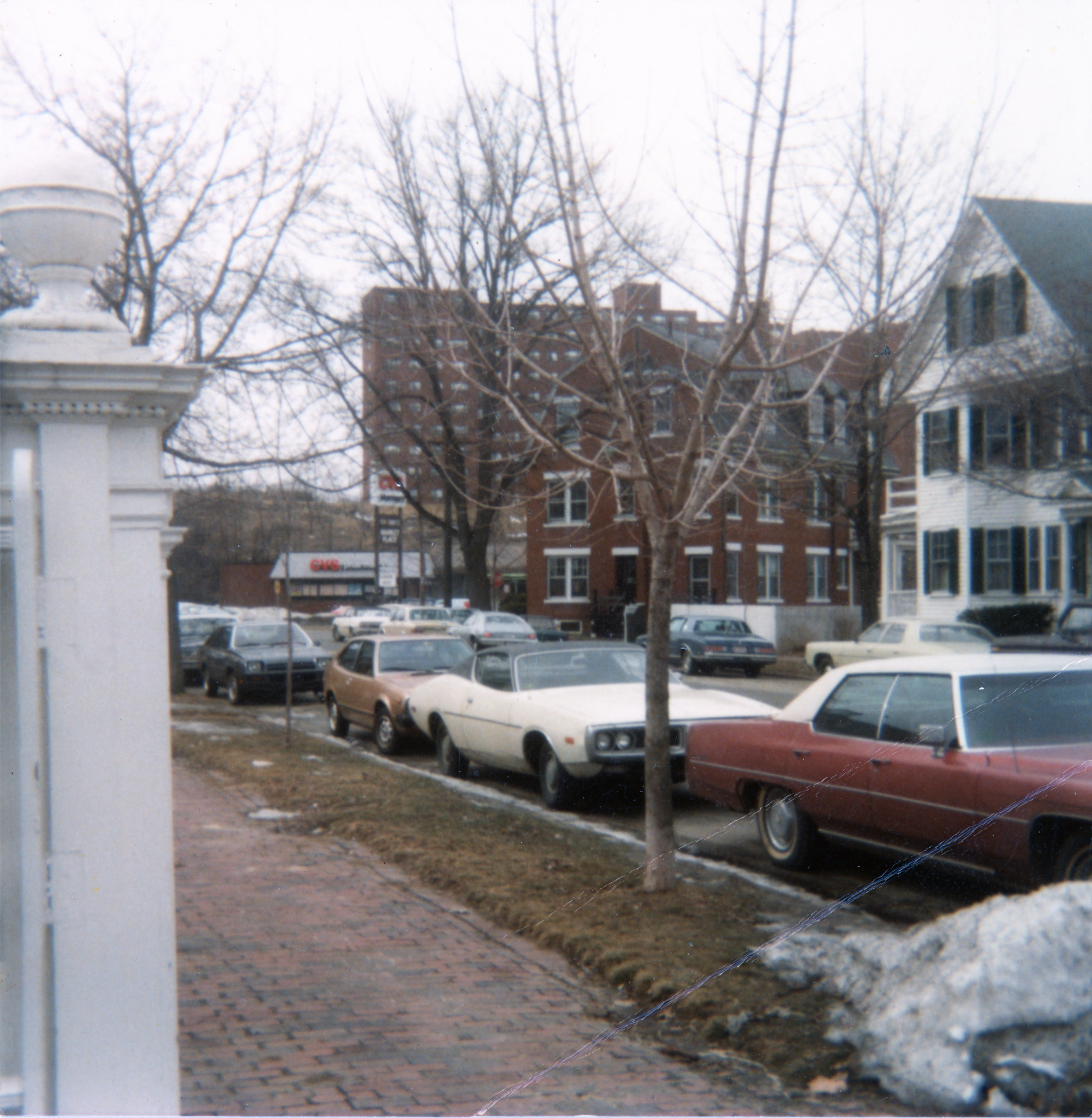 This photo is a little before my time, but looks very similar to when I was a kid. We used to go to that CVS and Crosby's all the time. In fact, we'd climb up the hill behind the CVS and pass through the apartment building parking lot at the top on our way back to Langdon St. I have scoped that area out recently, and it is no longer really open for that kind of passage! This photo looks like it was taken from the driveway of 45 Warren St.